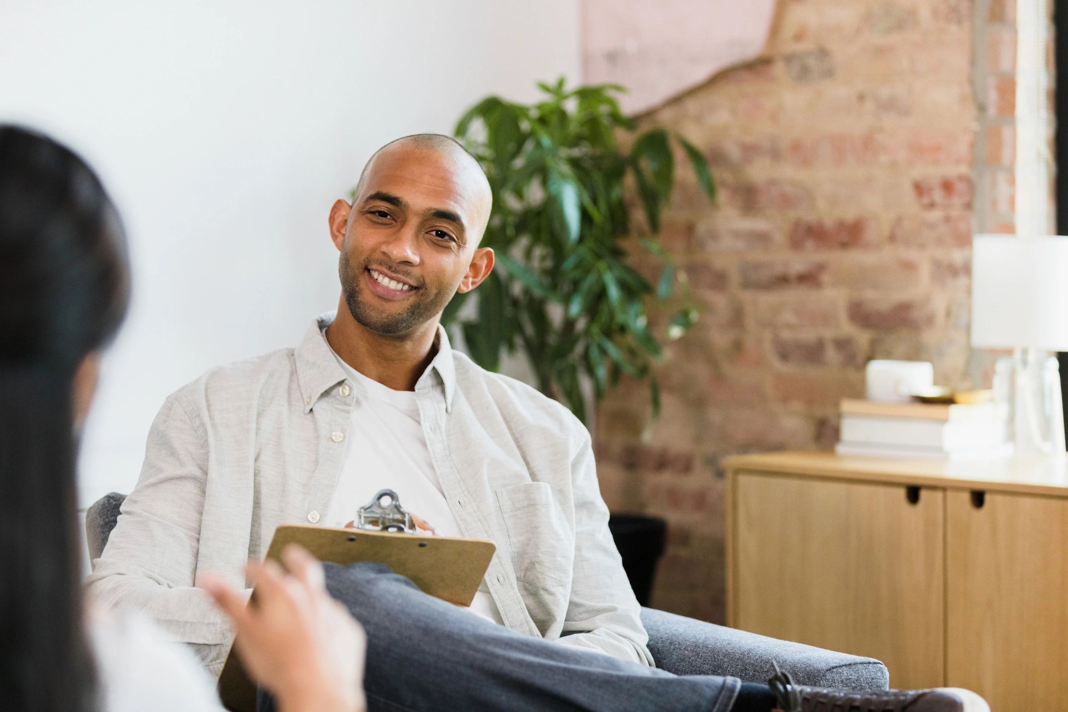 Counselor listening during a supportive conversation